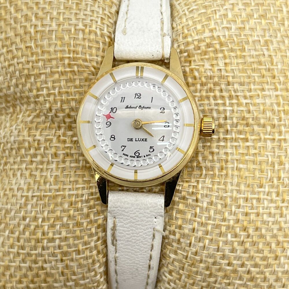 Vintage DE LUXE Islands Express Ladies Wristwatch W/ White Band Works